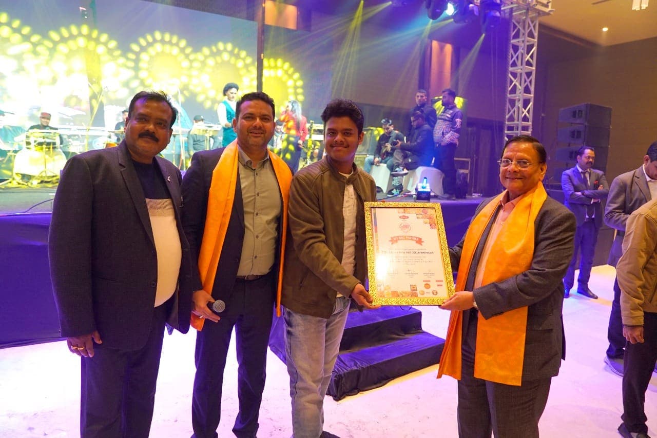 A certificate of recognition is presented during the awards